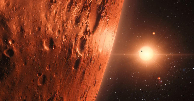 The surface of Mars viewed from space with the sun in the distance