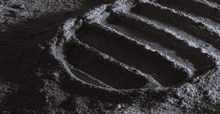 Footprint in the dust on the moon's surface